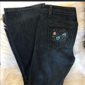 Woman’s jeans with hand painted design on back pocket